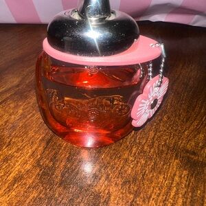 Coach floral blush Red Glass Perfume with Silver Cap